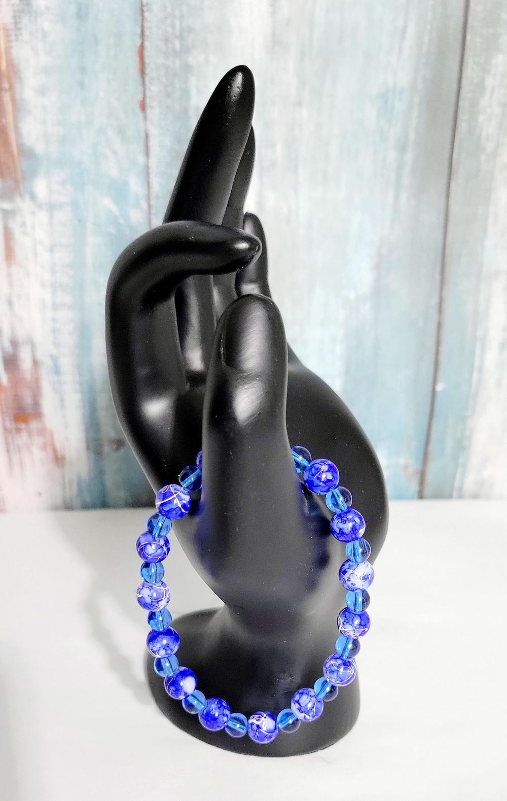 Hand crafted blue and white acrylic bead and translucent blu...